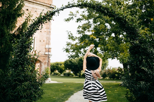 Creating a Serene Garden Oasis with a Classic Rose Arch